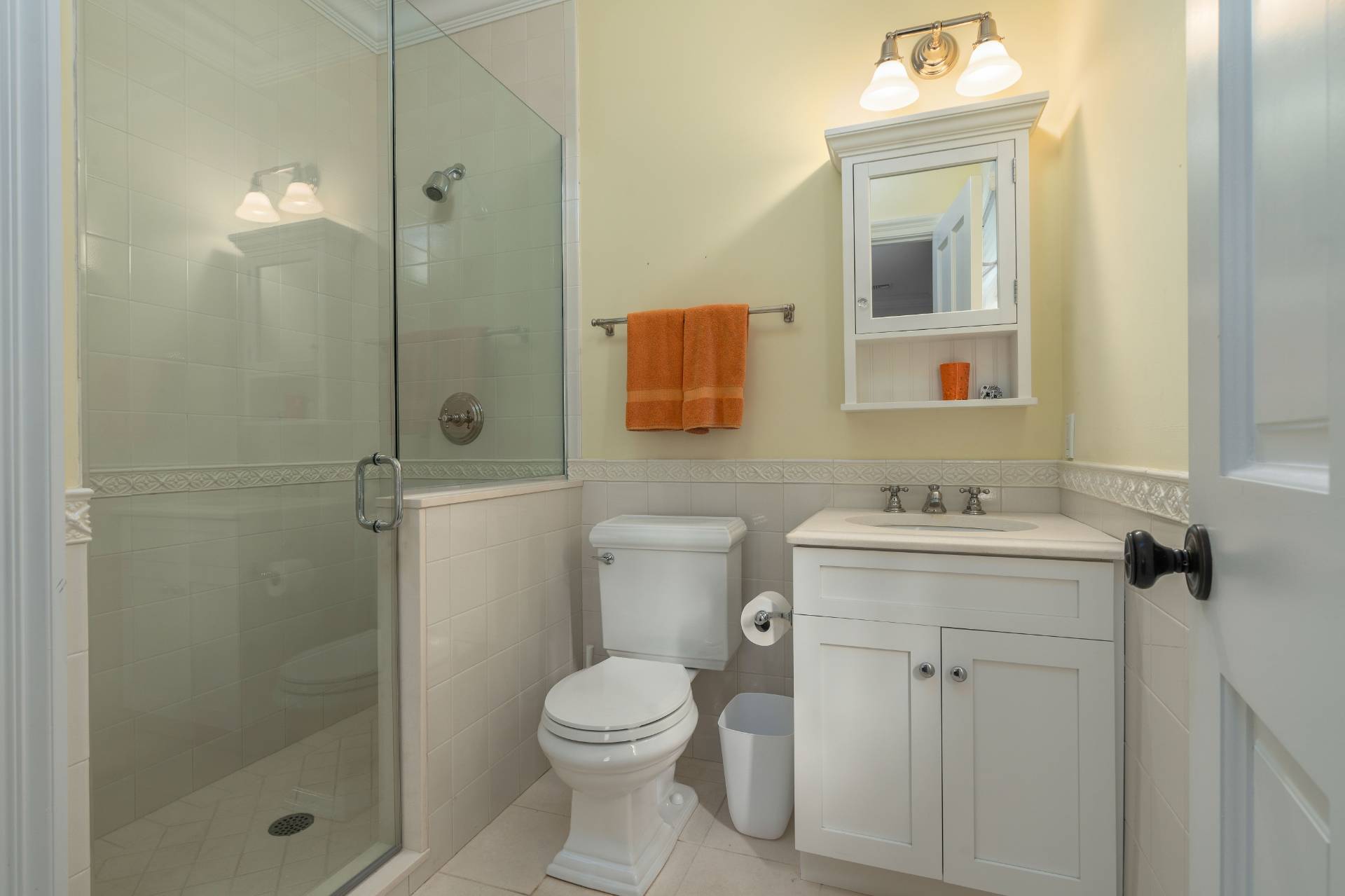 12 Old Point Road Quogue, NY 11959 - Photo 35 of 50 a bathroom with a sink a toilet and shower