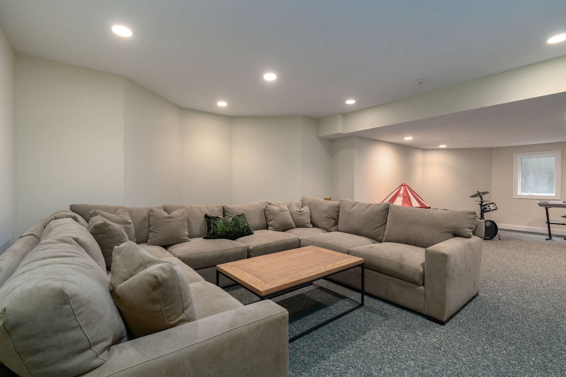 12 Old Point Road Quogue, NY 11959 - Photo 41 of 50 a living room with furniture white walls and a couch