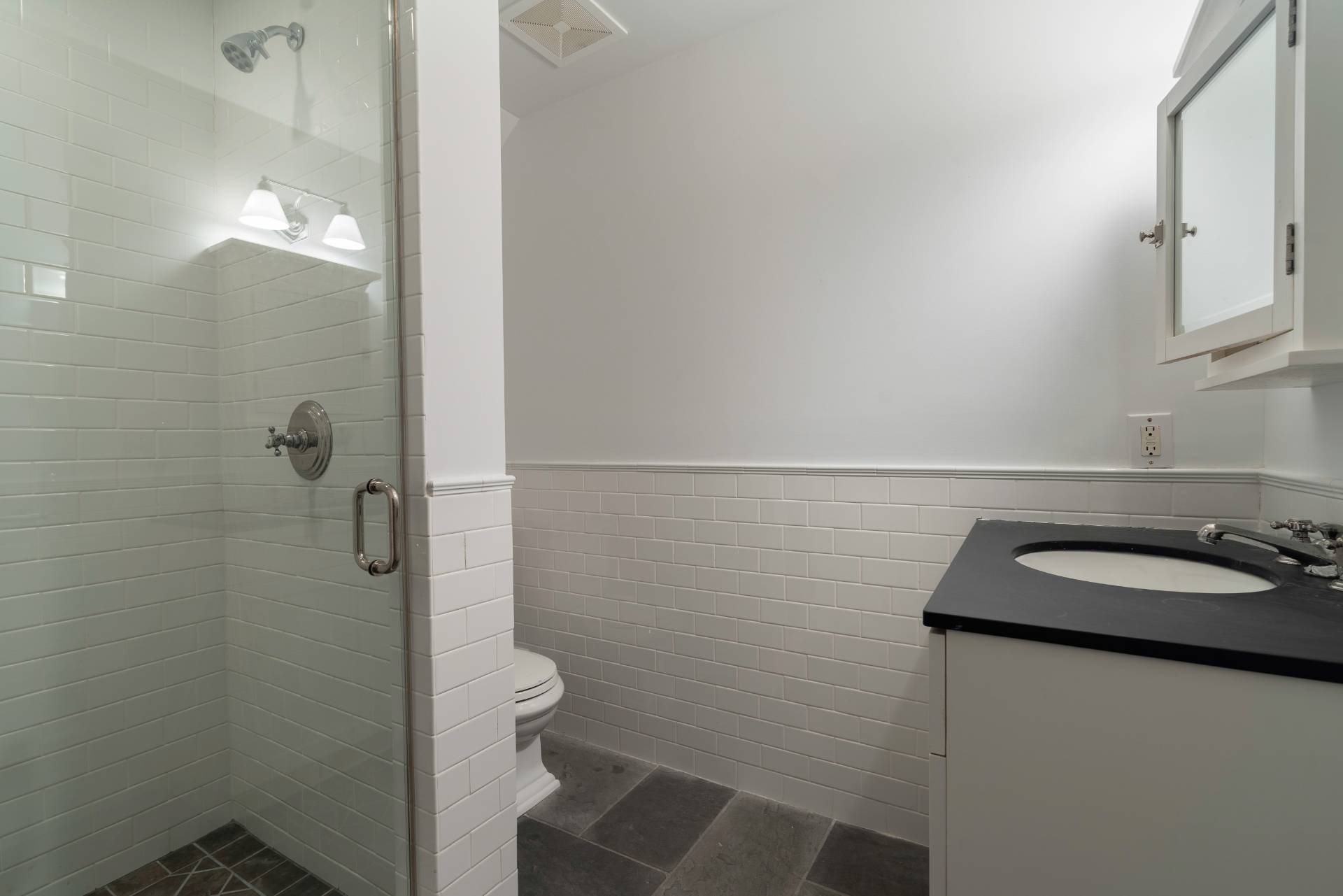12 Old Point Road Quogue, NY 11959 - Photo 49 of 50 a bathroom with a sink toilet and shower
