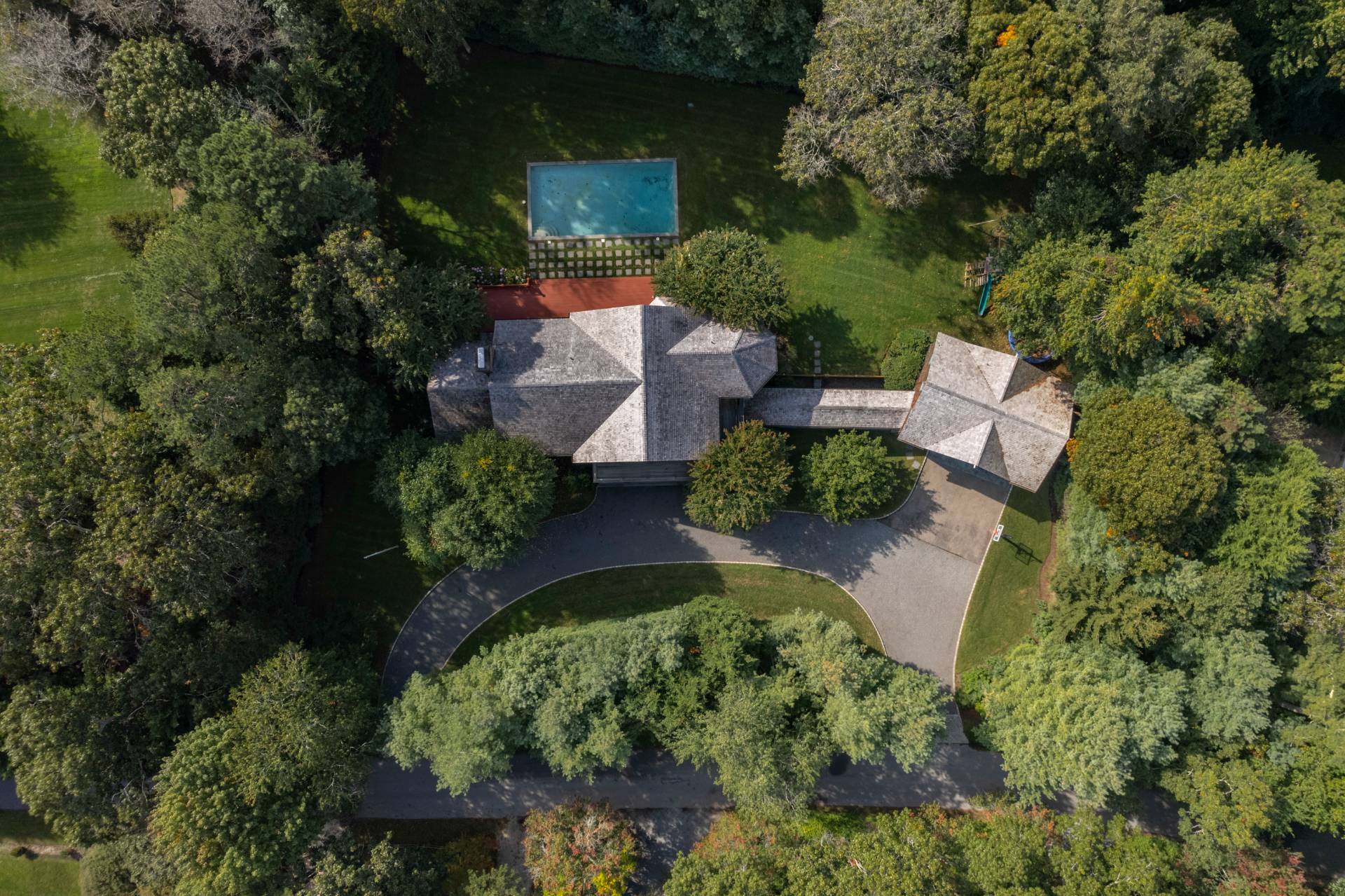 12 Old Point Road Quogue, NY 11959 - Photo 50 of 50 an aerial view of a house with a yard and green space