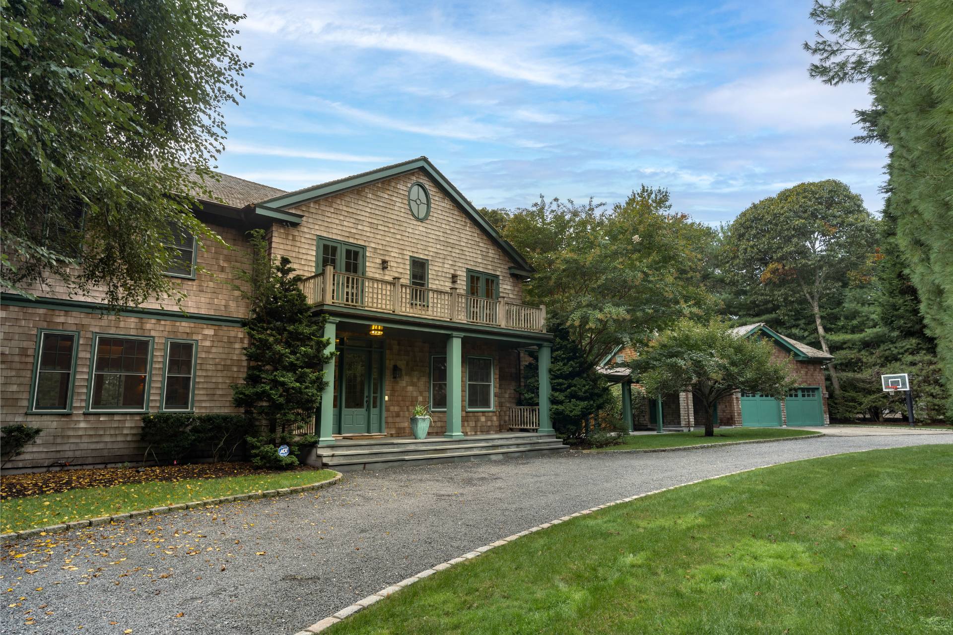 12 Old Point Road Quogue, NY 11959 - Photo 7 of 50 a front view of house with yard and green space