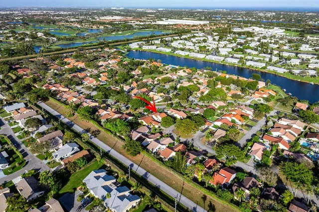 an aerial view of city and lake