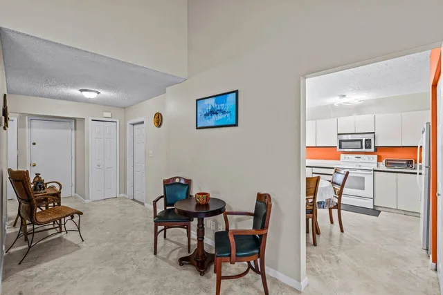 a workspace with furniture and a book shelf