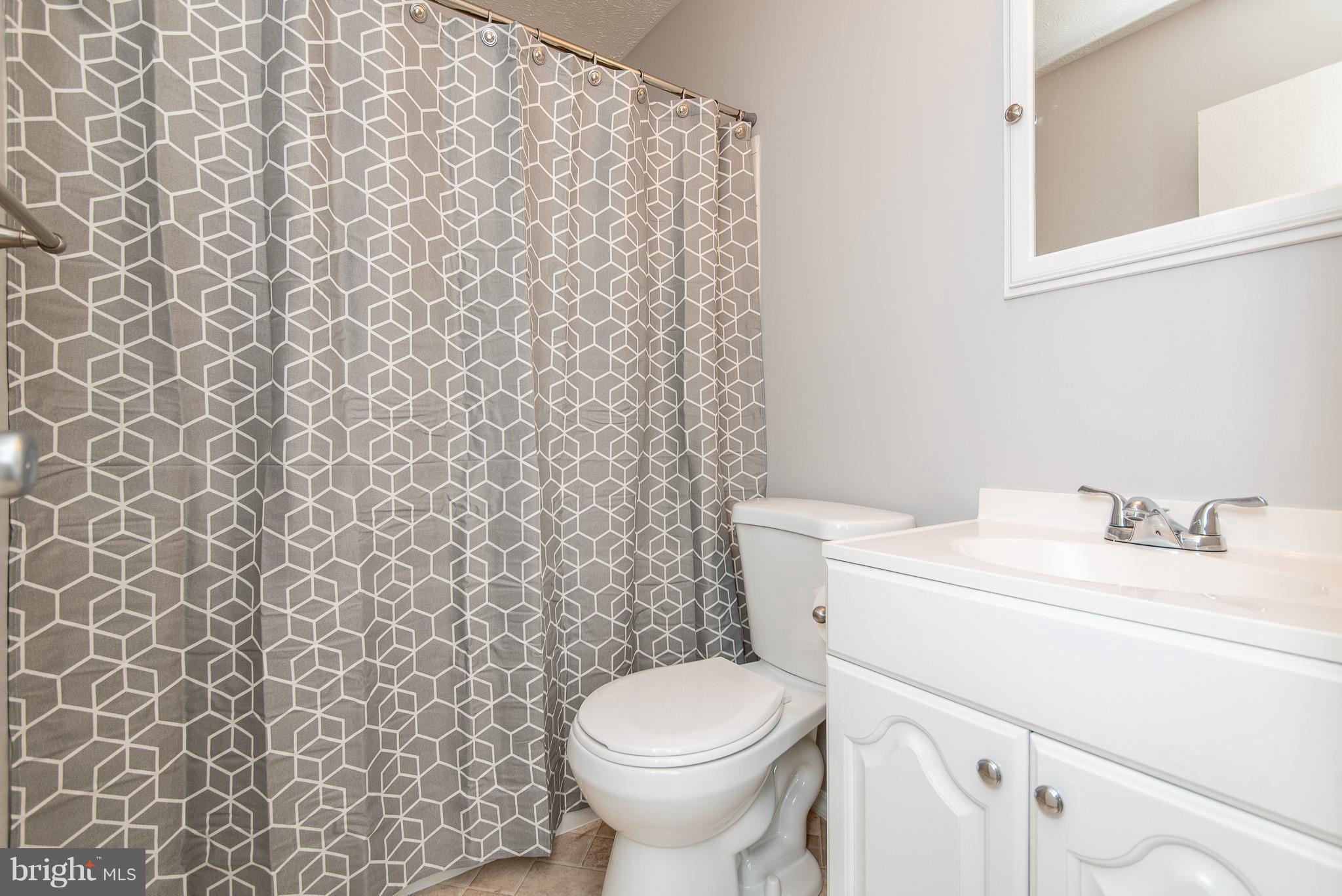 426 Kosoak Road Baltimore, MD 21220 - Photo 14 of 30 a bathroom with a toilet and a sink