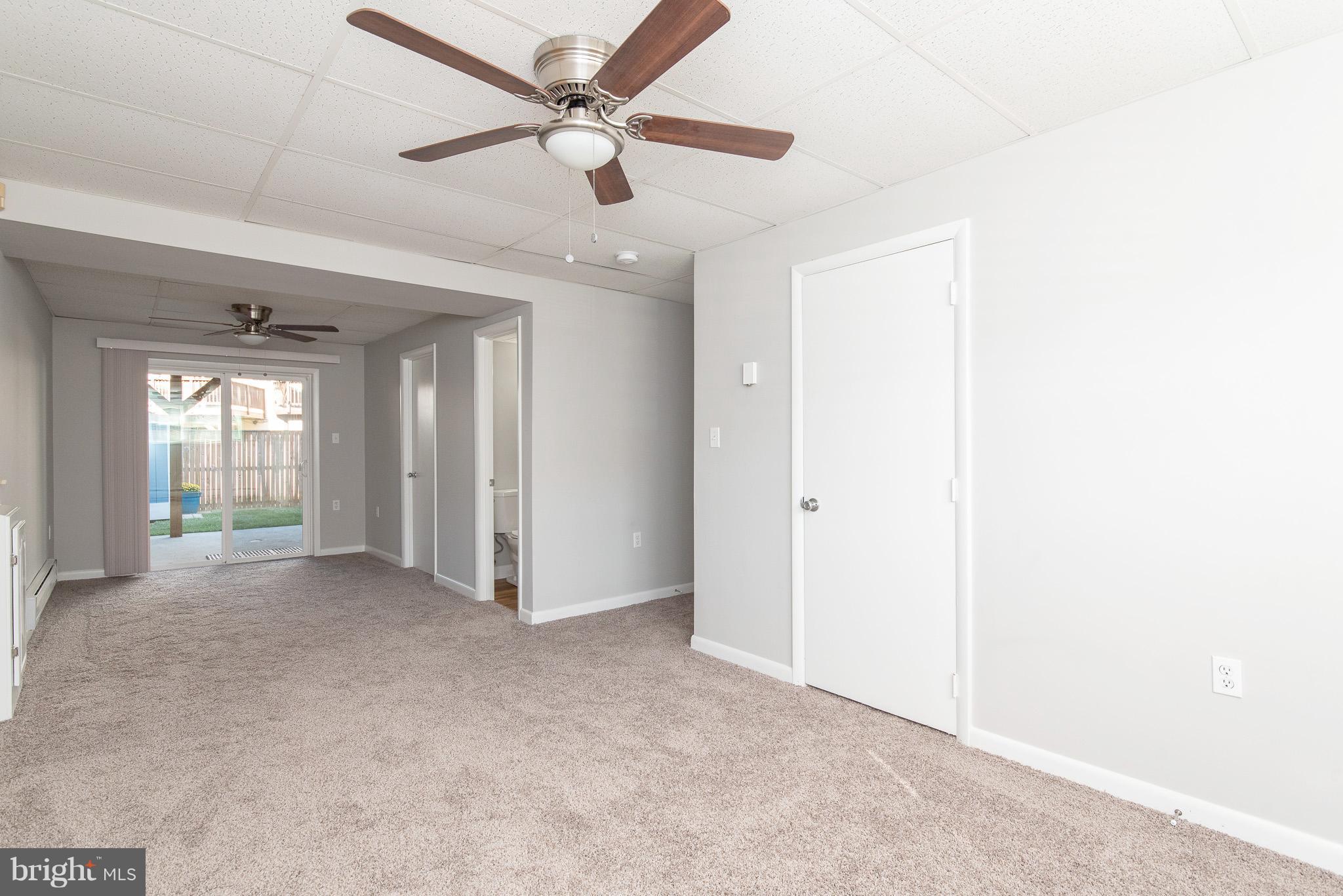 426 Kosoak Road Baltimore, MD 21220 - Photo 20 of 30 a view of a livingroom with a ceiling fan and window