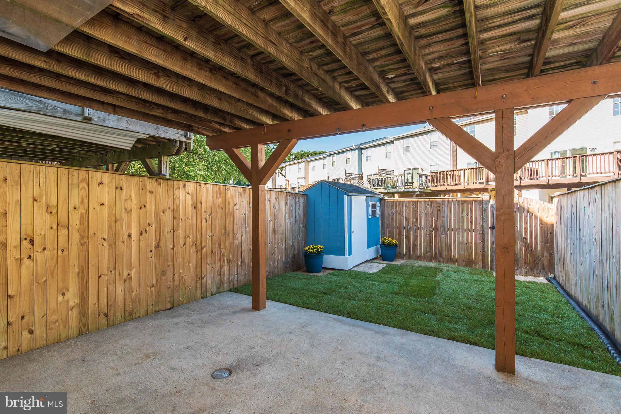 426 Kosoak Road Baltimore, MD 21220 - Photo 25 of 30 a view of a backyard with wooden fence