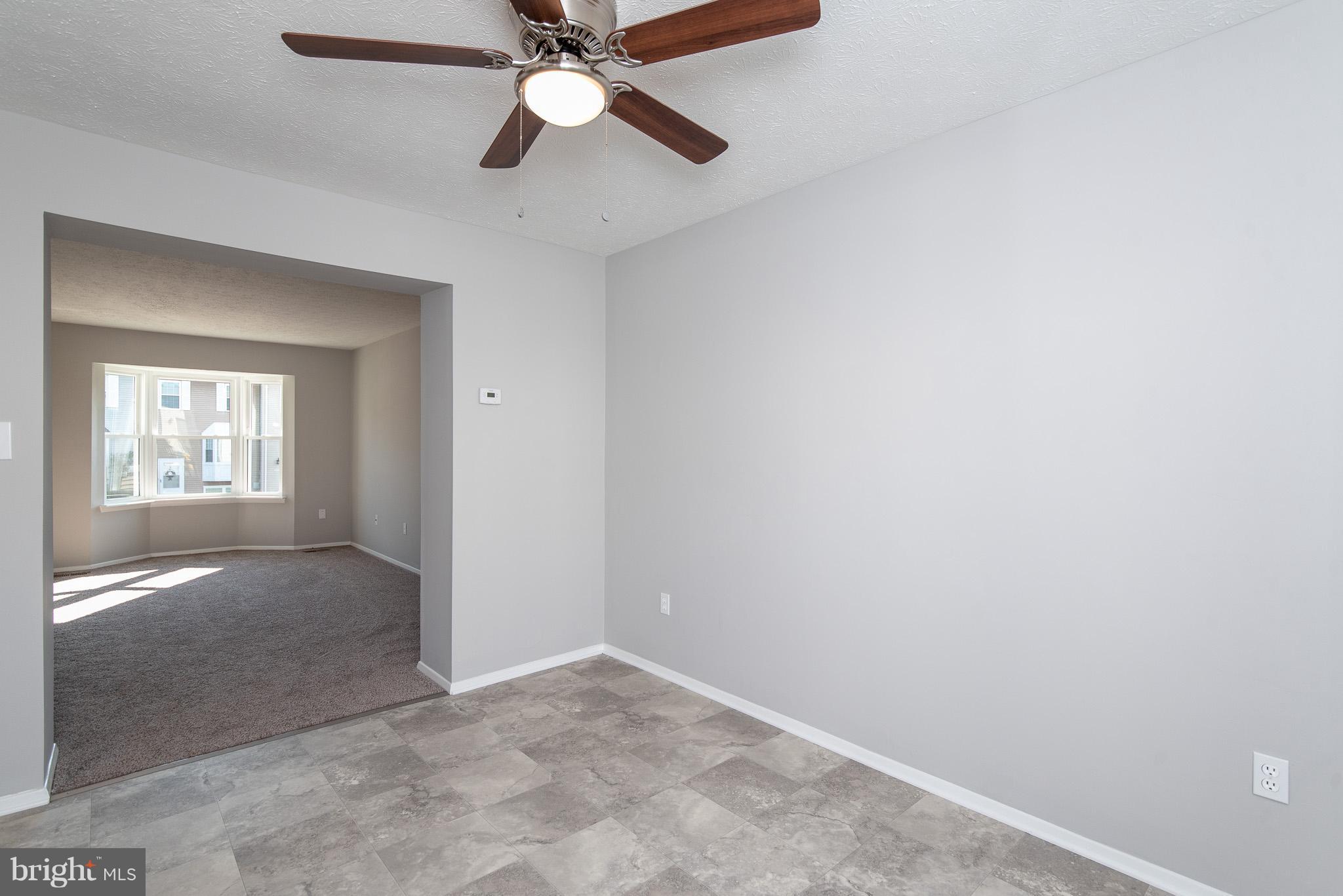 426 Kosoak Road Baltimore, MD 21220 - Photo 6 of 30 a view of entryway and hall with a chandelier fan