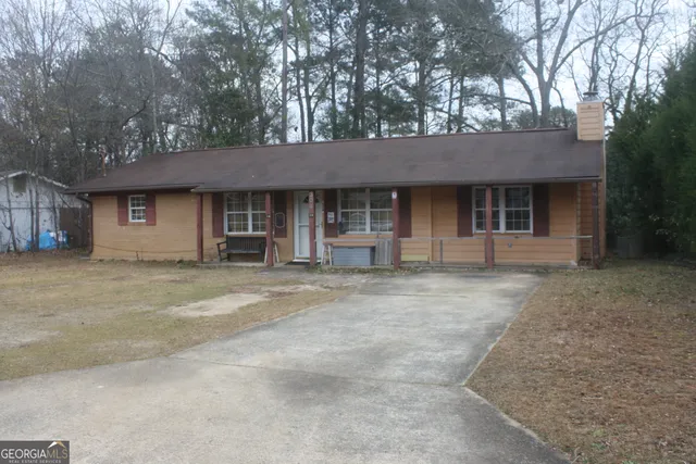 a front view of a house with a garage