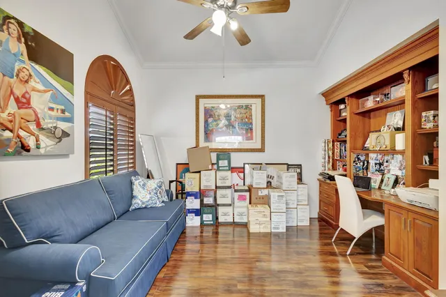 a bedroom with a bed and a table