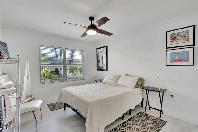 a bed room with a bed and dresser