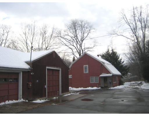 492 Easthampton Road Northampton, MA 01060 - Photo 3 of 3 a house with trees in the background