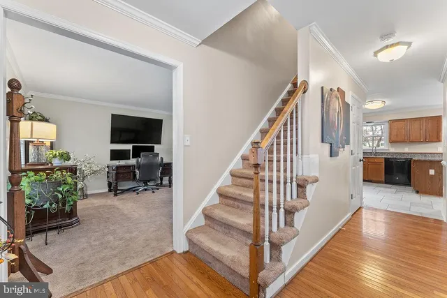 a view of workspace with furniture and windows