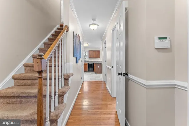 a room with furniture and a flat screen tv