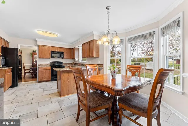 a en suite bathroom with a shower and a mirror