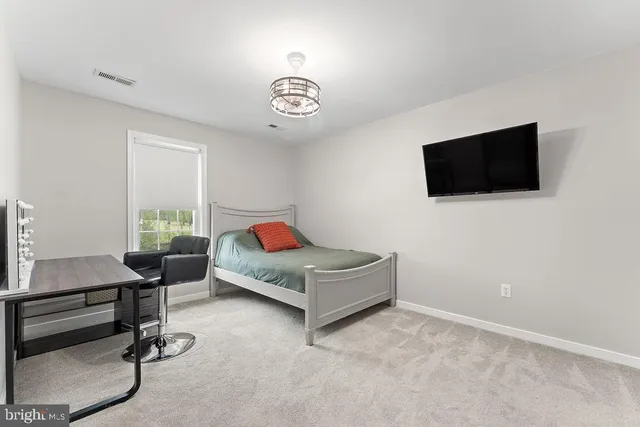 a bathroom with a toilet sink and shower