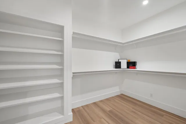 a view of an empty walk in closet