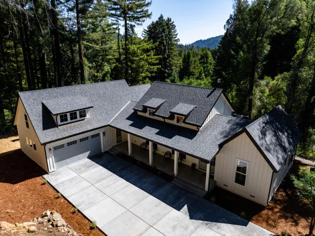 a view of a house with a roof deck