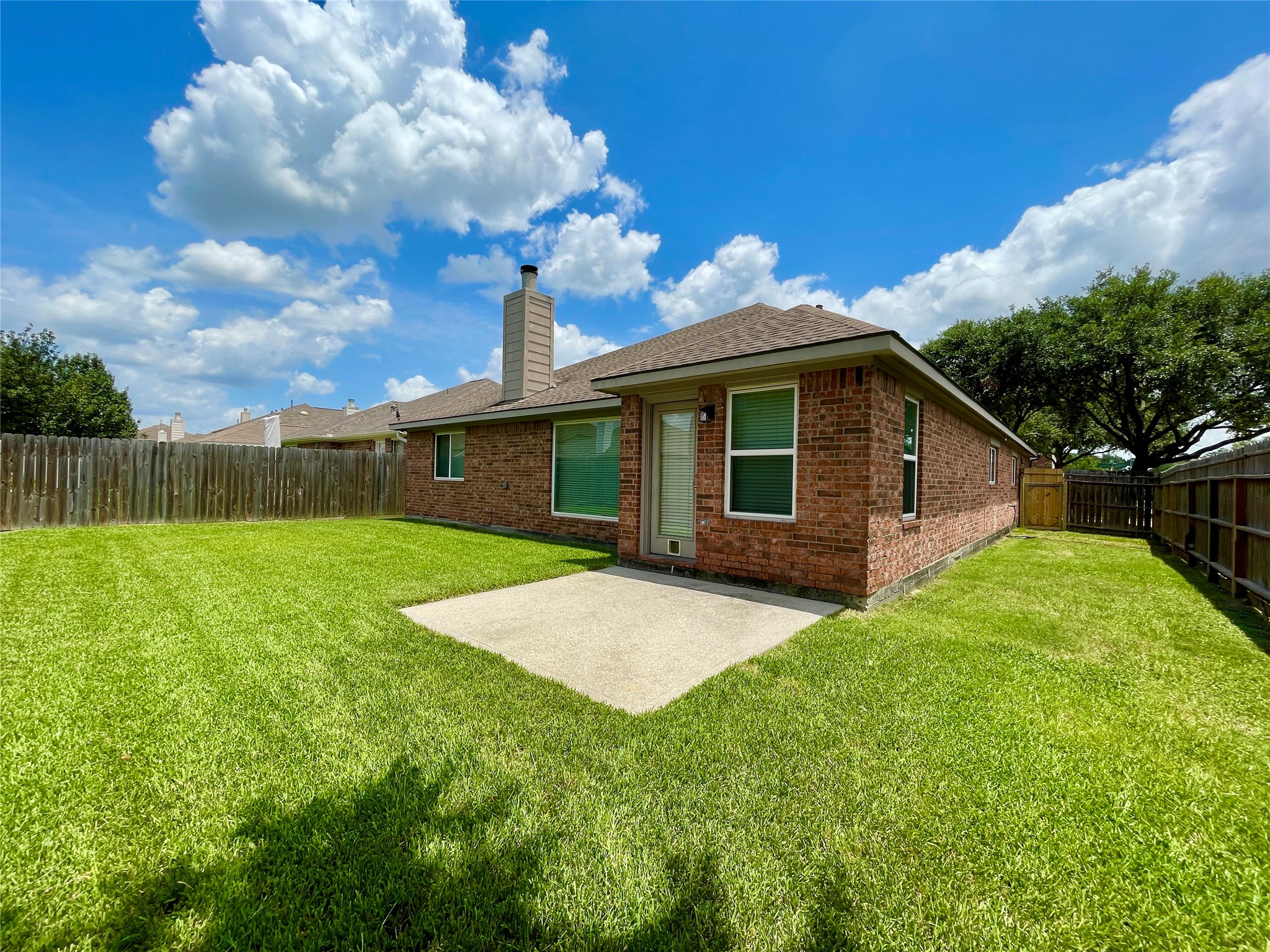 20503 Spring Aspen Lane Spring, TX 77388 - Photo 21 of 25 Backyard w/Patio