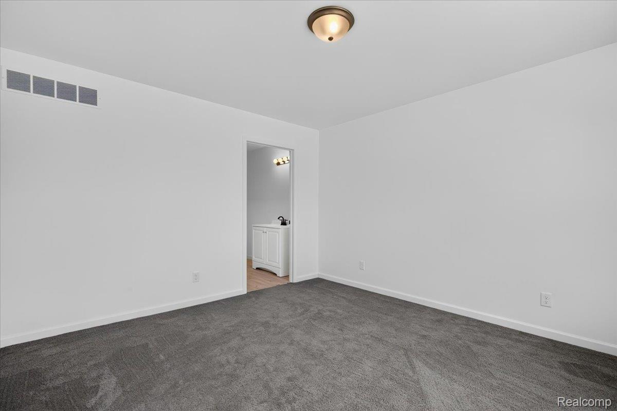 3156 Daisy Way Burton, MI 48519 - Photo 23 of 38 31-2026.07.06_ACloutier_DaisyWay198.jpg