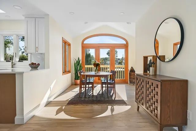 a bathroom with a tub shower and sink