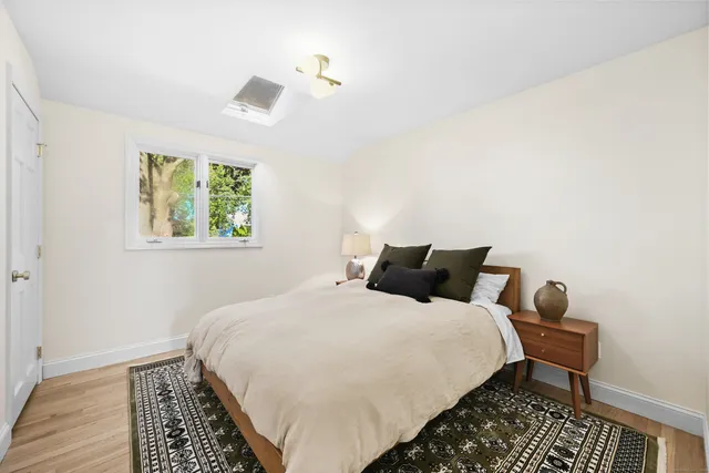 a view of a backyard with wooden fence