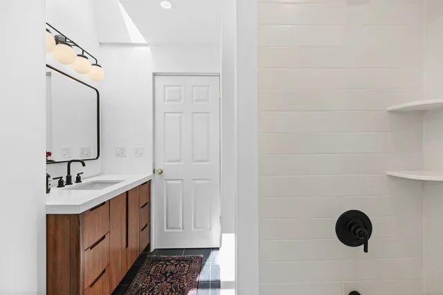 a picture of a bathroom with a sink