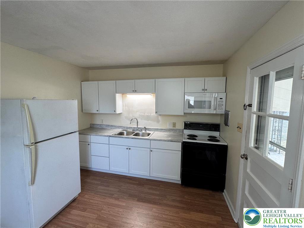 3003 Cornwall Road Bethlehem, PA 18017 - Photo 11 of 43 a kitchen with stainless steel appliances a refrigerator sink and cabinets