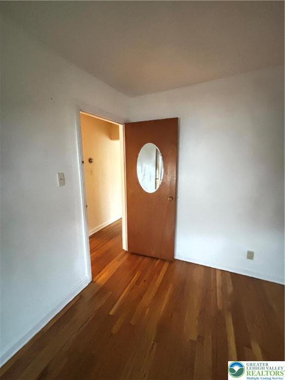 3003 Cornwall Road Bethlehem, PA 18017 - Photo 20 of 43 a view of a room with wooden floor and a window