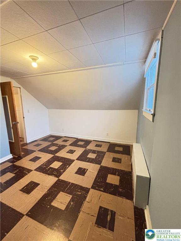 3003 Cornwall Road Bethlehem, PA 18017 - Photo 29 of 43 a bedroom with a bed and a black white checkered floor