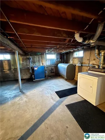 a view of an empty room with stairs