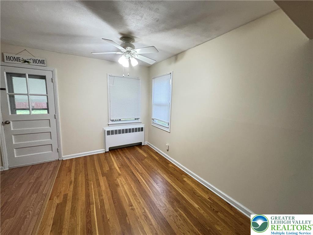 3003 Cornwall Road Bethlehem, PA 18017 - Photo 10 of 43 wooden floor in an empty room with a window
