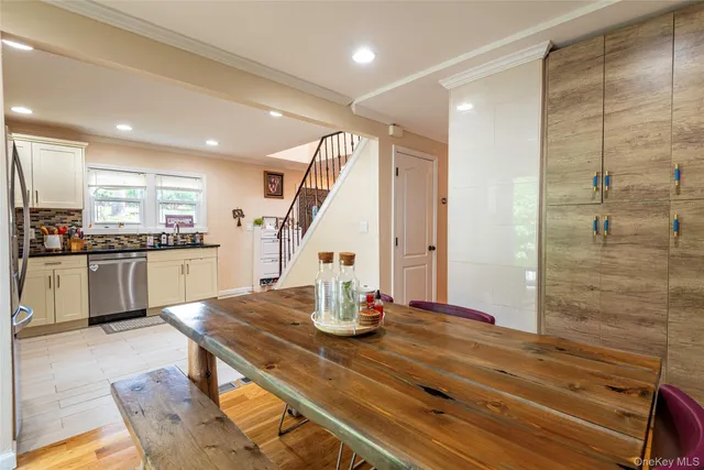 a kitchen with a table and chairs
