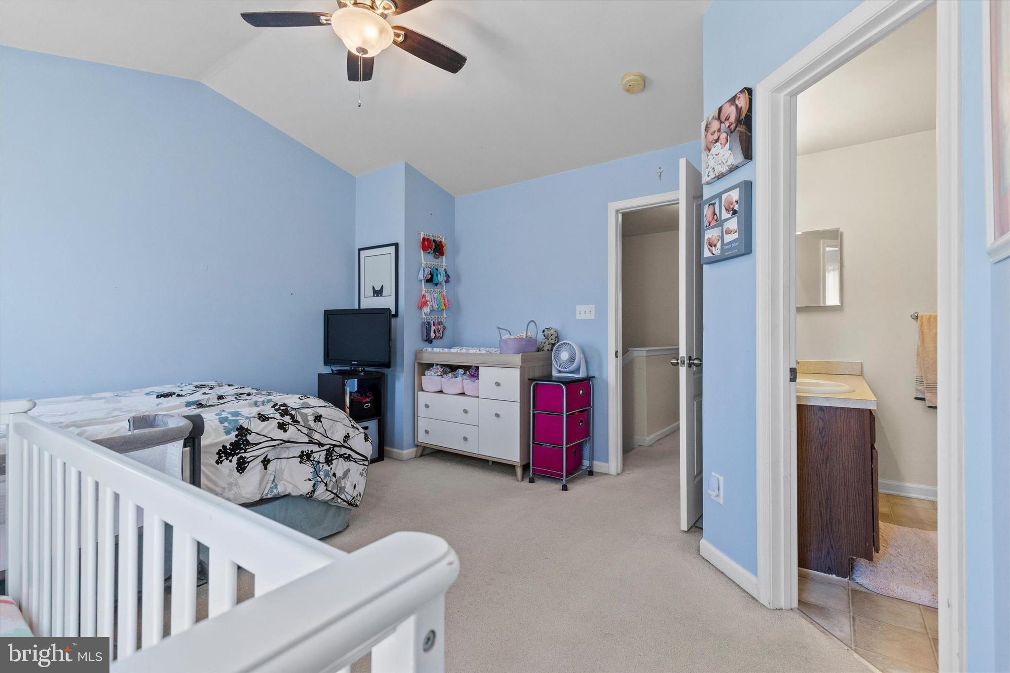 4113 Trabert Court Dover, PA 17315 - Photo 17 of 28 a bedroom with a bed and a chandelier