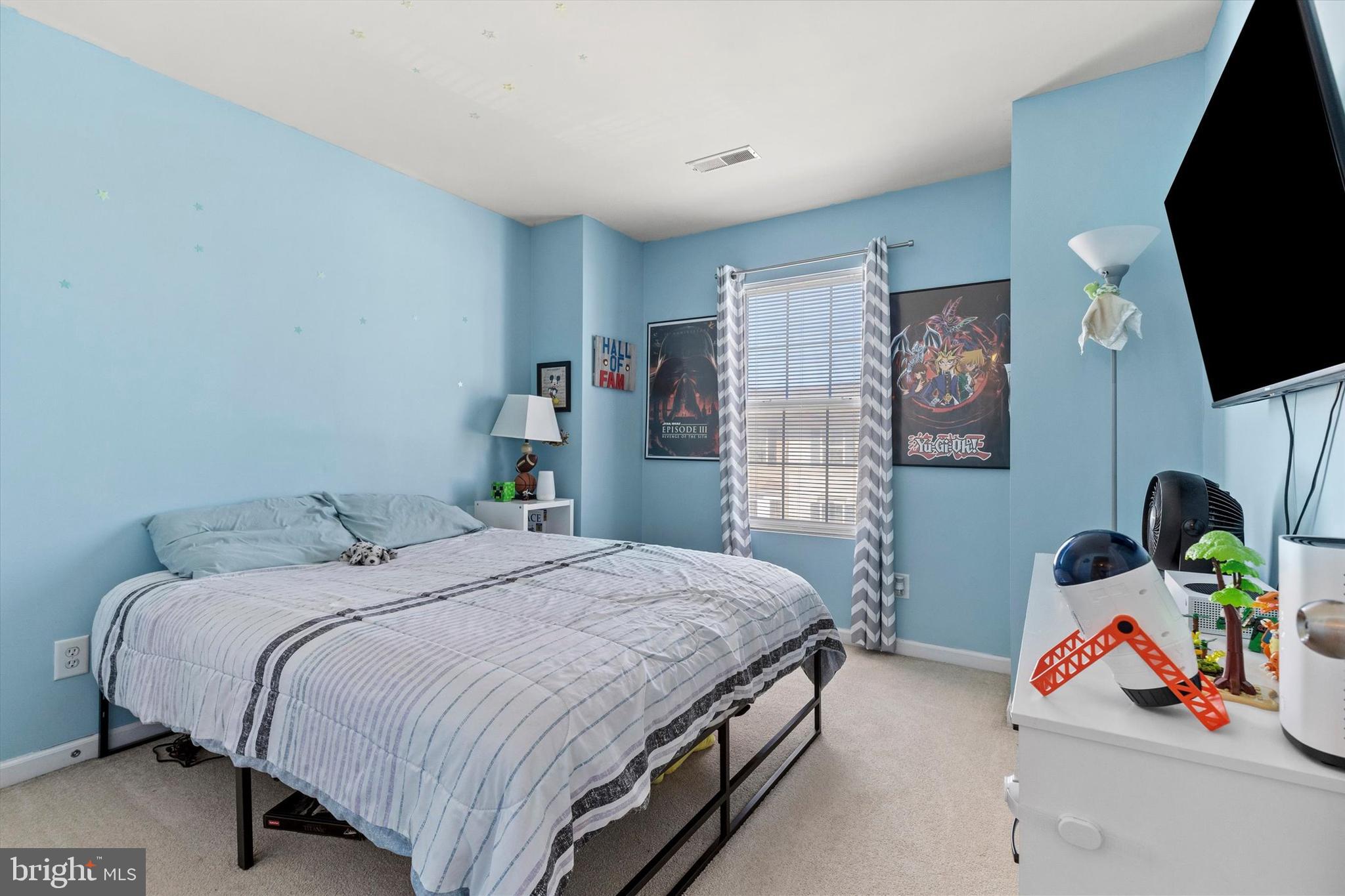4113 Trabert Court Dover, PA 17315 - Photo 20 of 28 a bedroom with a bed and a flat screen tv