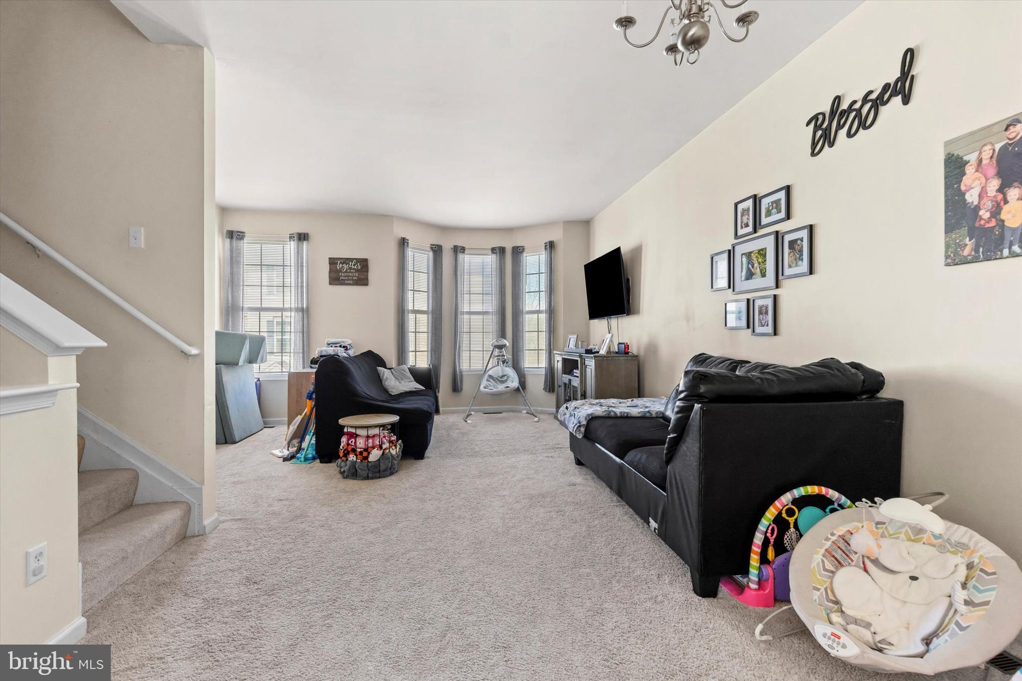 4113 Trabert Court Dover, PA 17315 - Photo 8 of 28 a living room with furniture and a flat screen tv