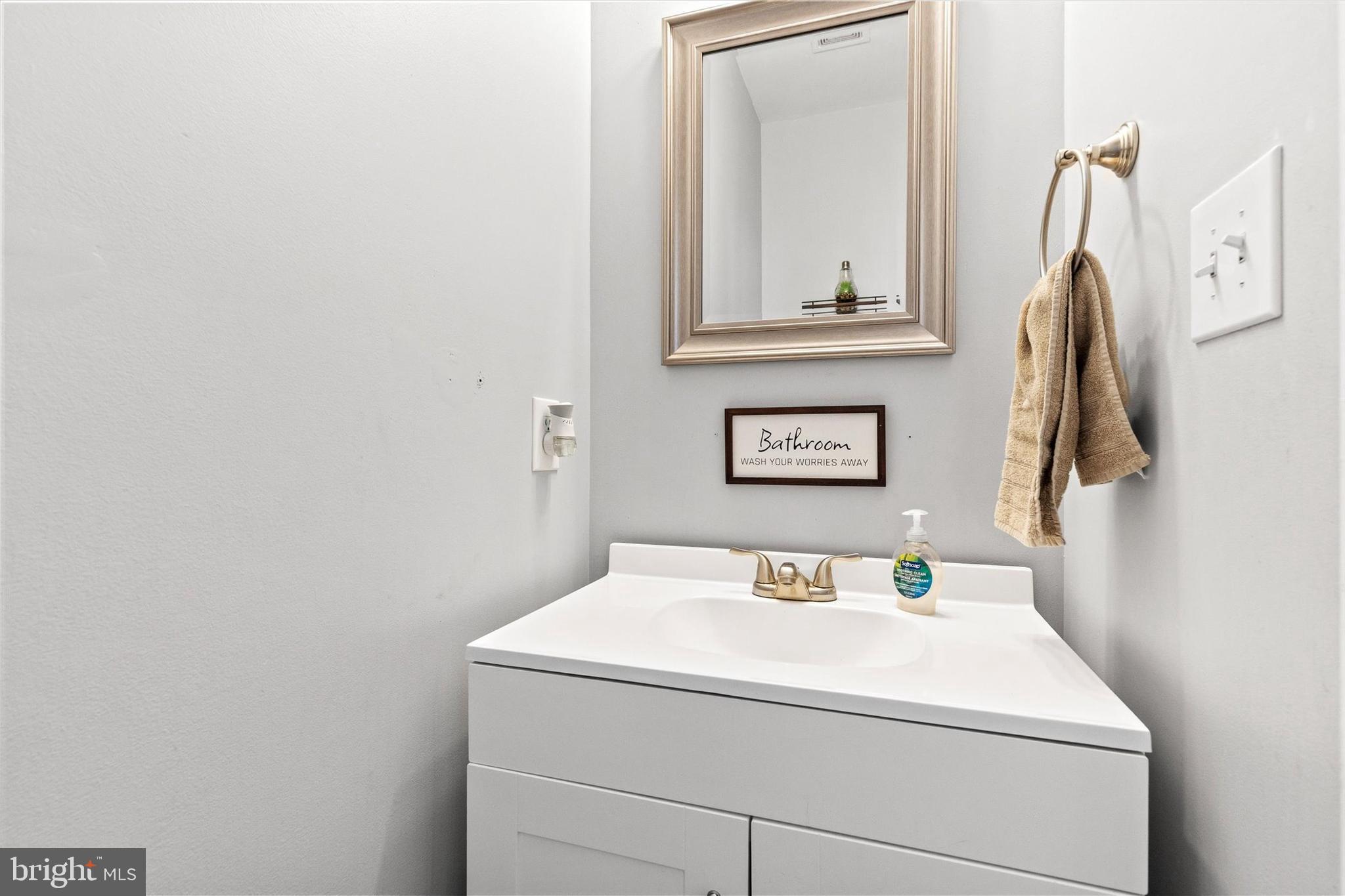 4113 Trabert Court Dover, PA 17315 - Photo 10 of 28 a bathroom with a sink and a mirror