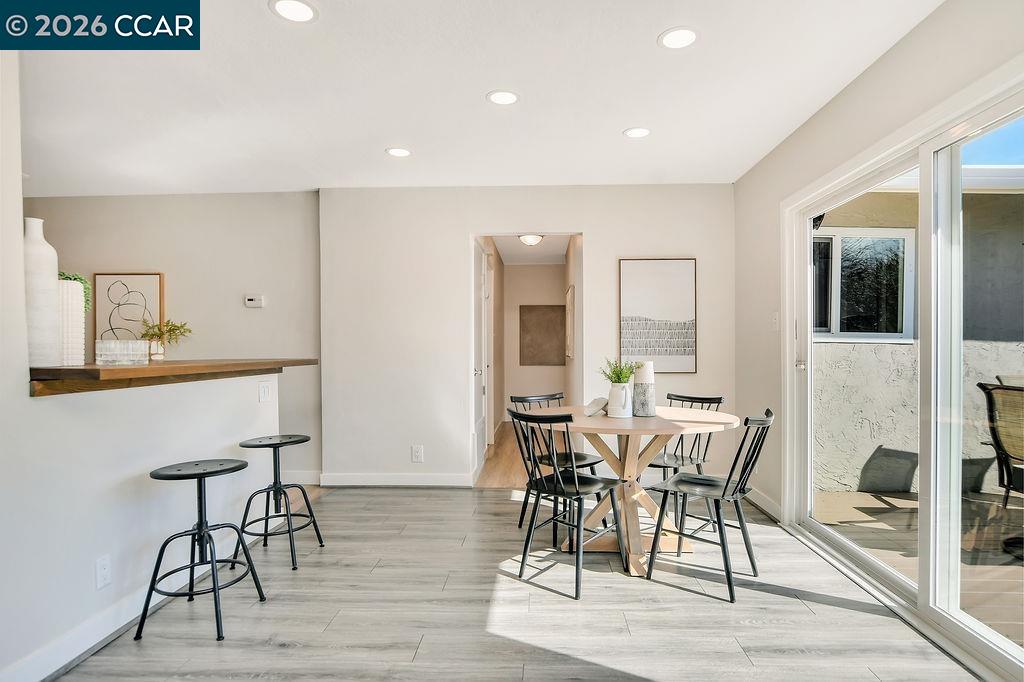 508 Viewmont Street Benicia, CA 94510 - Photo 12 of 34 a view of a dining room with furniture and wooden floor