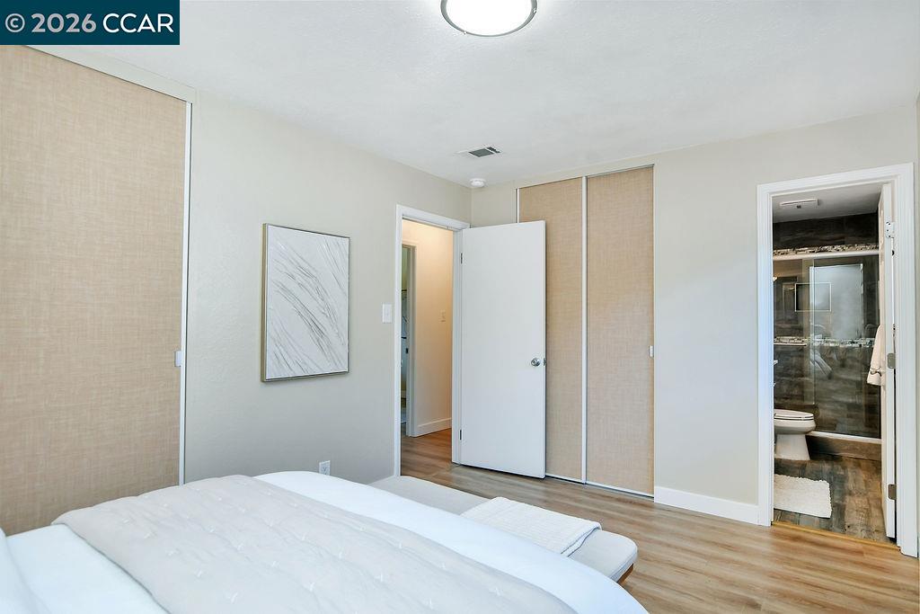 508 Viewmont Street Benicia, CA 94510 - Photo 15 of 34 a bedroom with a bed and a window