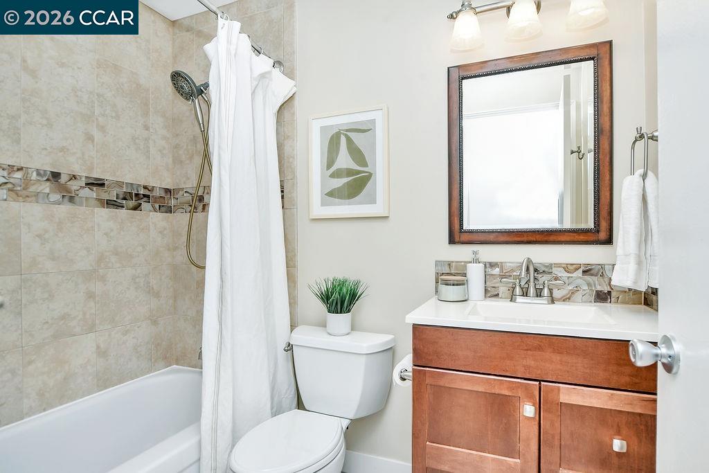 508 Viewmont Street Benicia, CA 94510 - Photo 19 of 34 a bathroom with a sink toilet and shower
