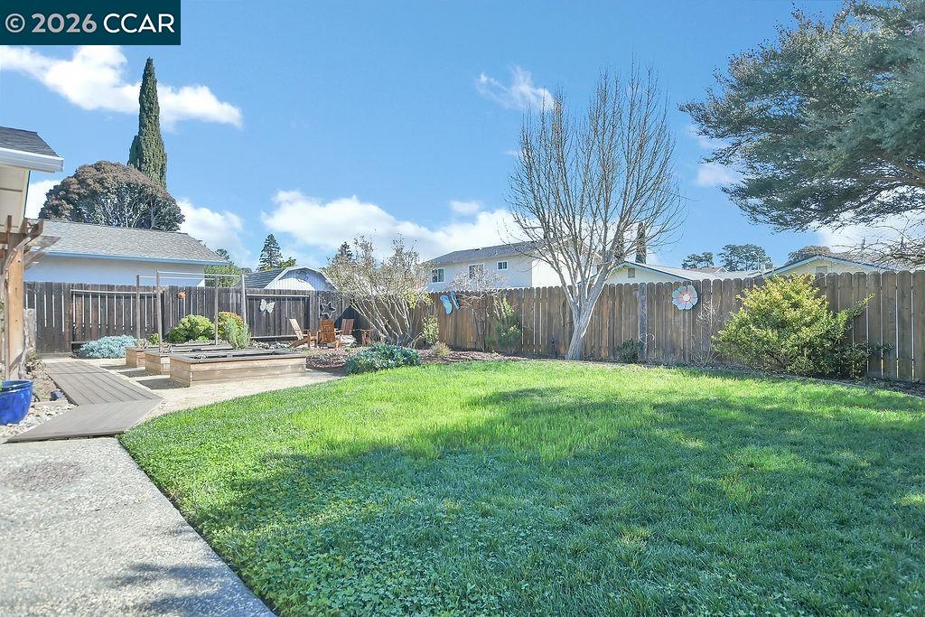 508 Viewmont Street Benicia, CA 94510 - Photo 26 of 34 a view of a house with backyard and a sitting area