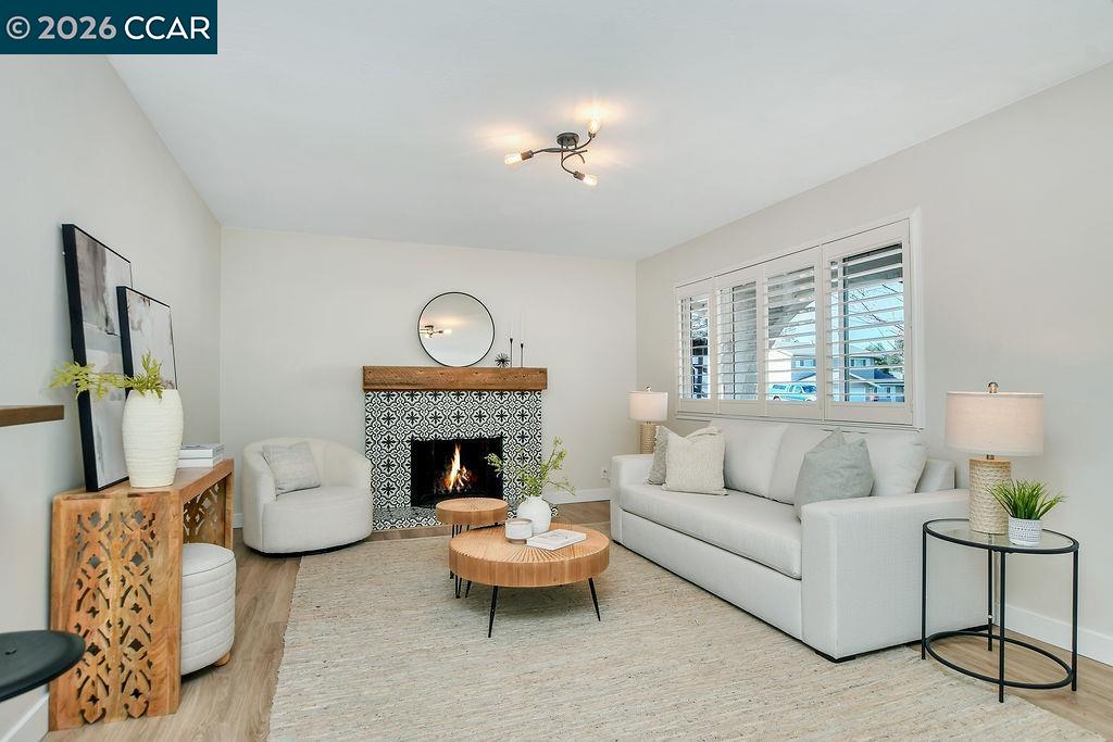 508 Viewmont Street Benicia, CA 94510 - Photo 5 of 34 a living room with furniture and a fireplace