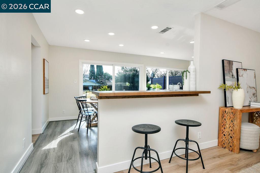 508 Viewmont Street Benicia, CA 94510 - Photo 7 of 34 a kitchen with a table and chairs in it