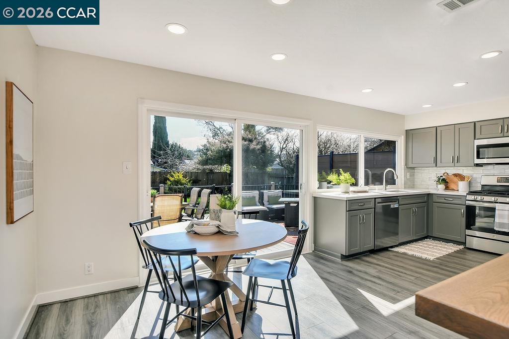 508 Viewmont Street Benicia, CA 94510 - Photo 8 of 34 a kitchen with a table and chairs in it