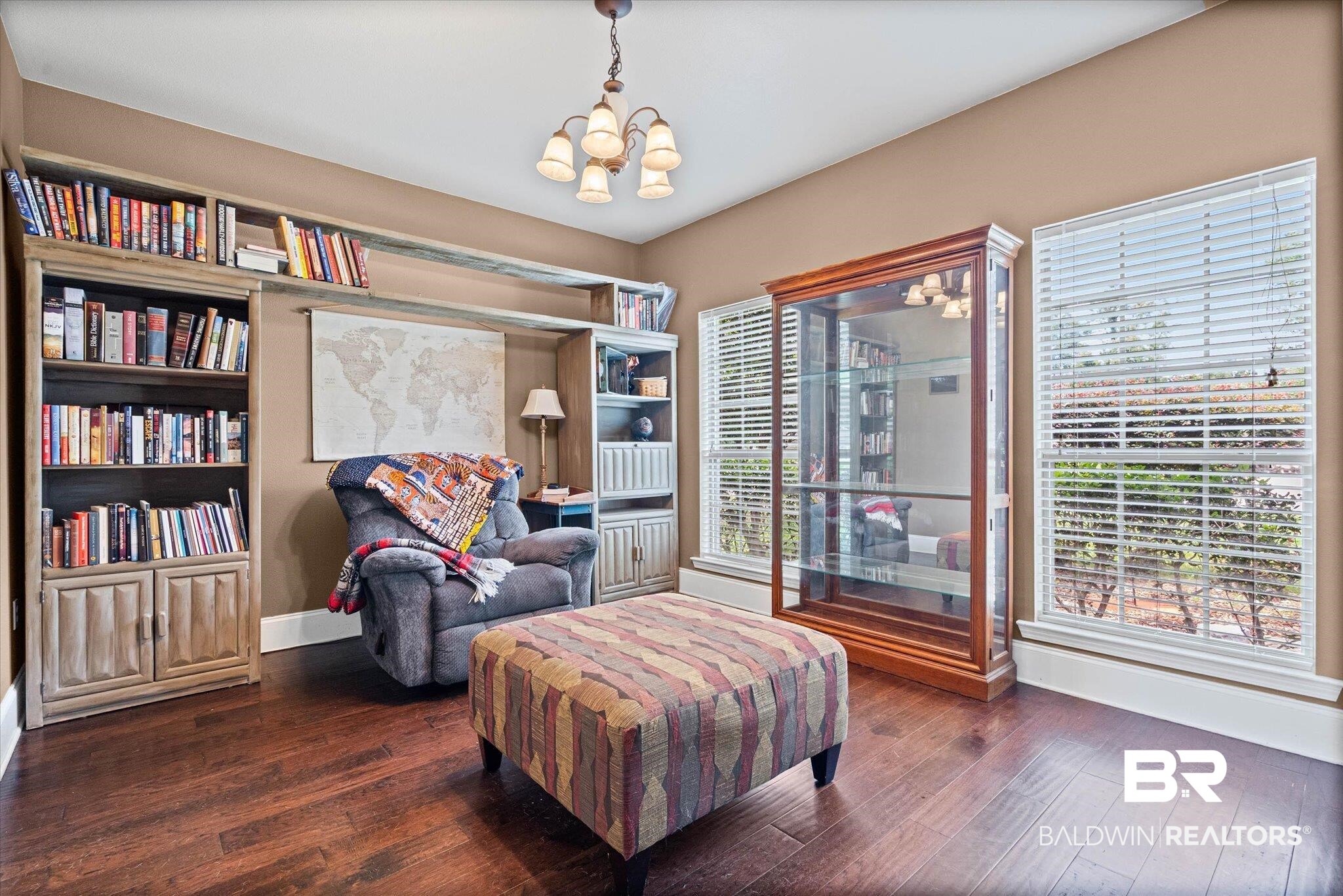 585 Sheffield Avenue Foley, AL 36535 - Photo 3 of 45 Warm interior space featuring wood-finish flooring and neutral wall tones