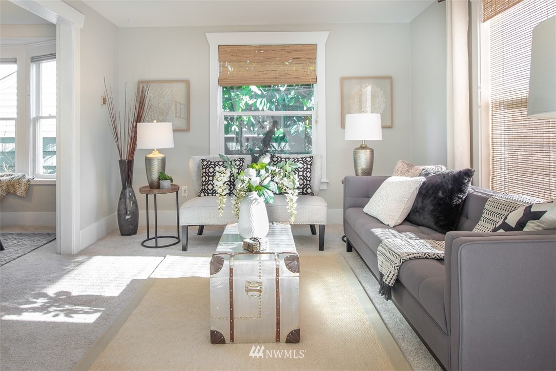 424 North 68th Street Seattle, WA 98103 - Photo 3 of 26 a living room with furniture and a large window