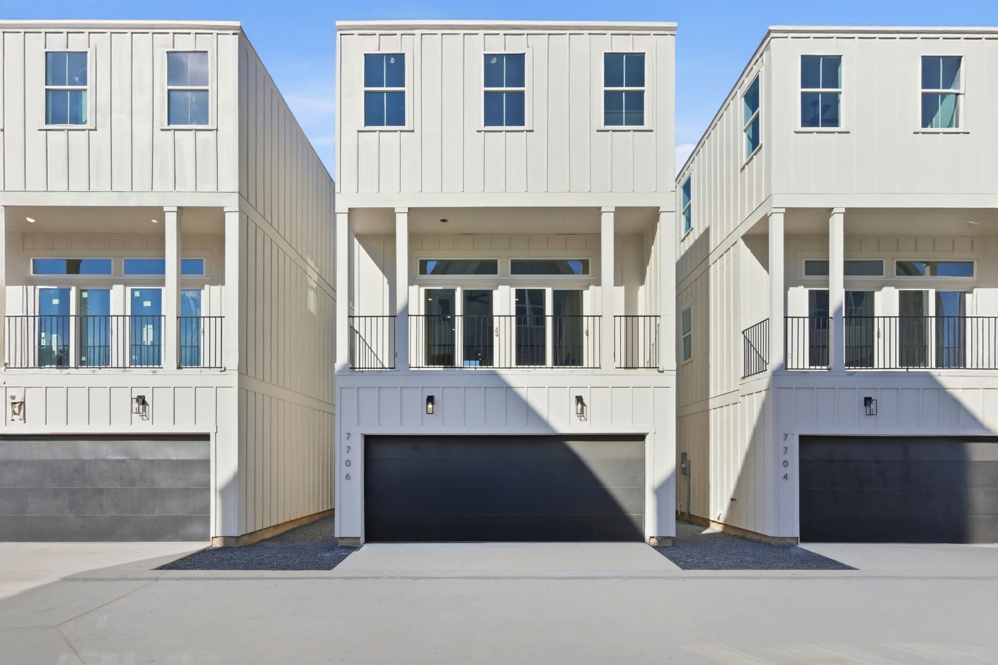 a front view of a building with large windows