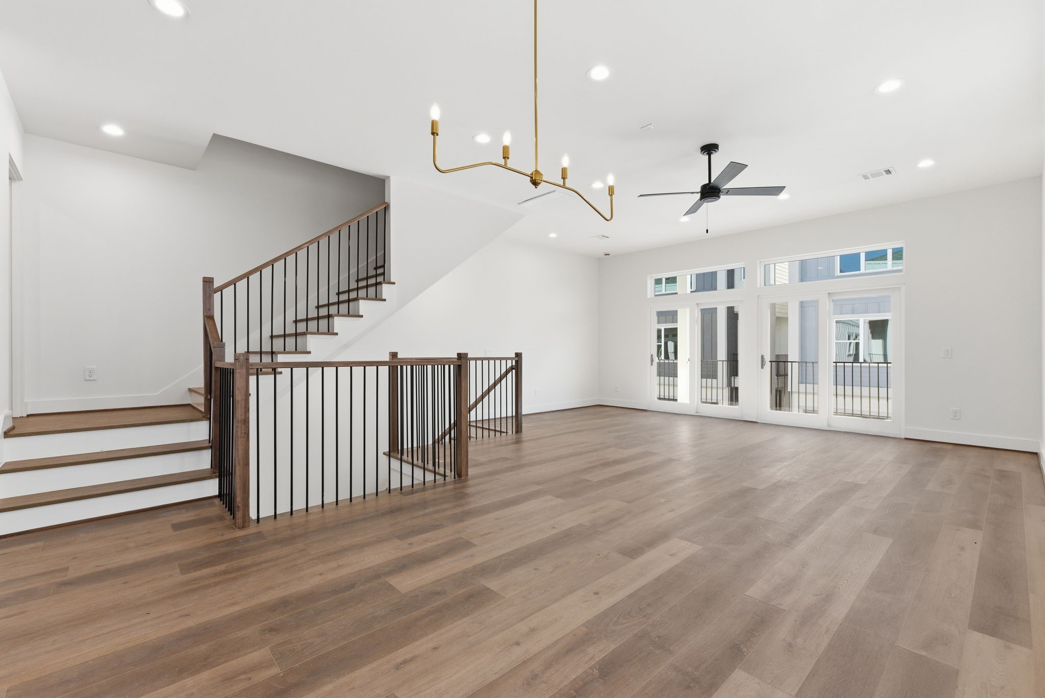 7706 Earl Rudder Way Houston, TX 77055 - Photo 16 of 46 a view of entryway and hall with wooden floor