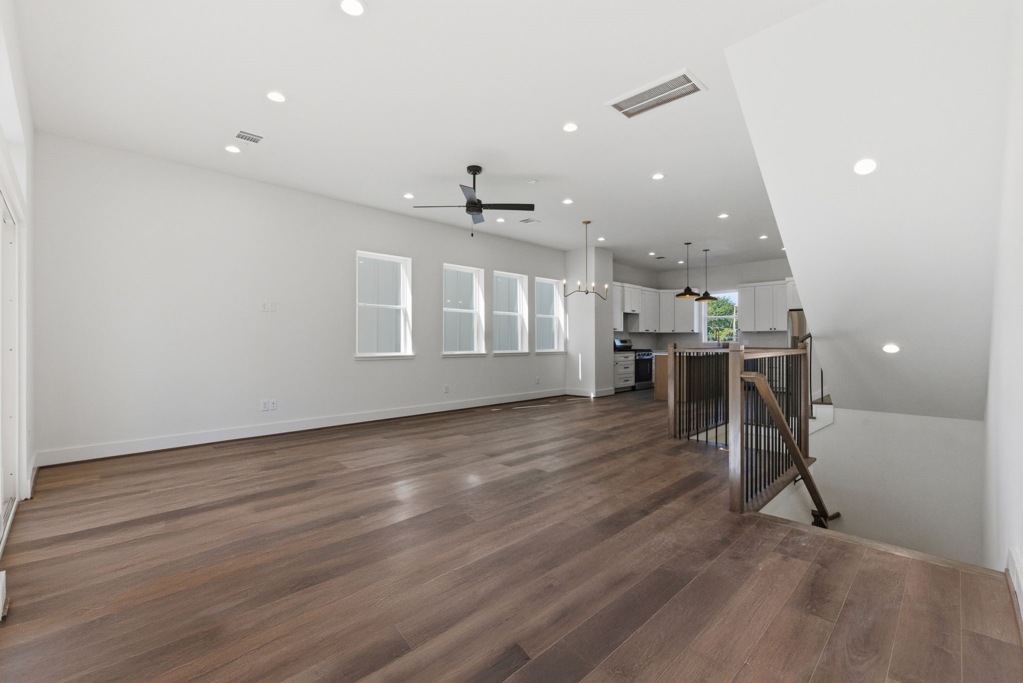 7706 Earl Rudder Way Houston, TX 77055 - Photo 18 of 46 a view of a kitchen with a table and chairs