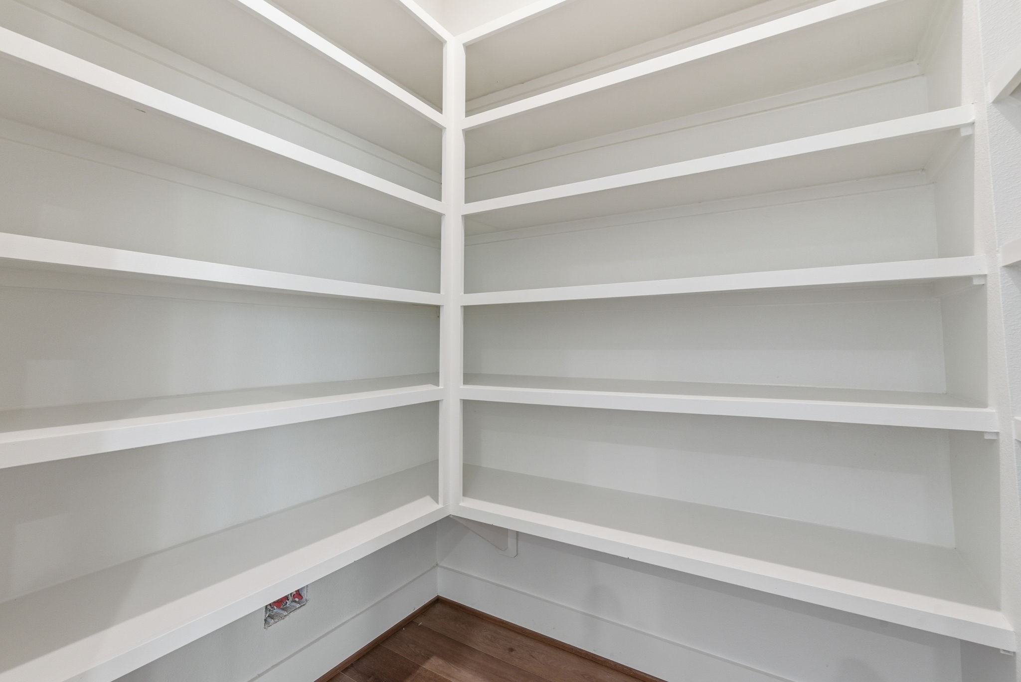 7706 Earl Rudder Way Houston, TX 77055 - Photo 25 of 46 a view of walk in closet with empty racks