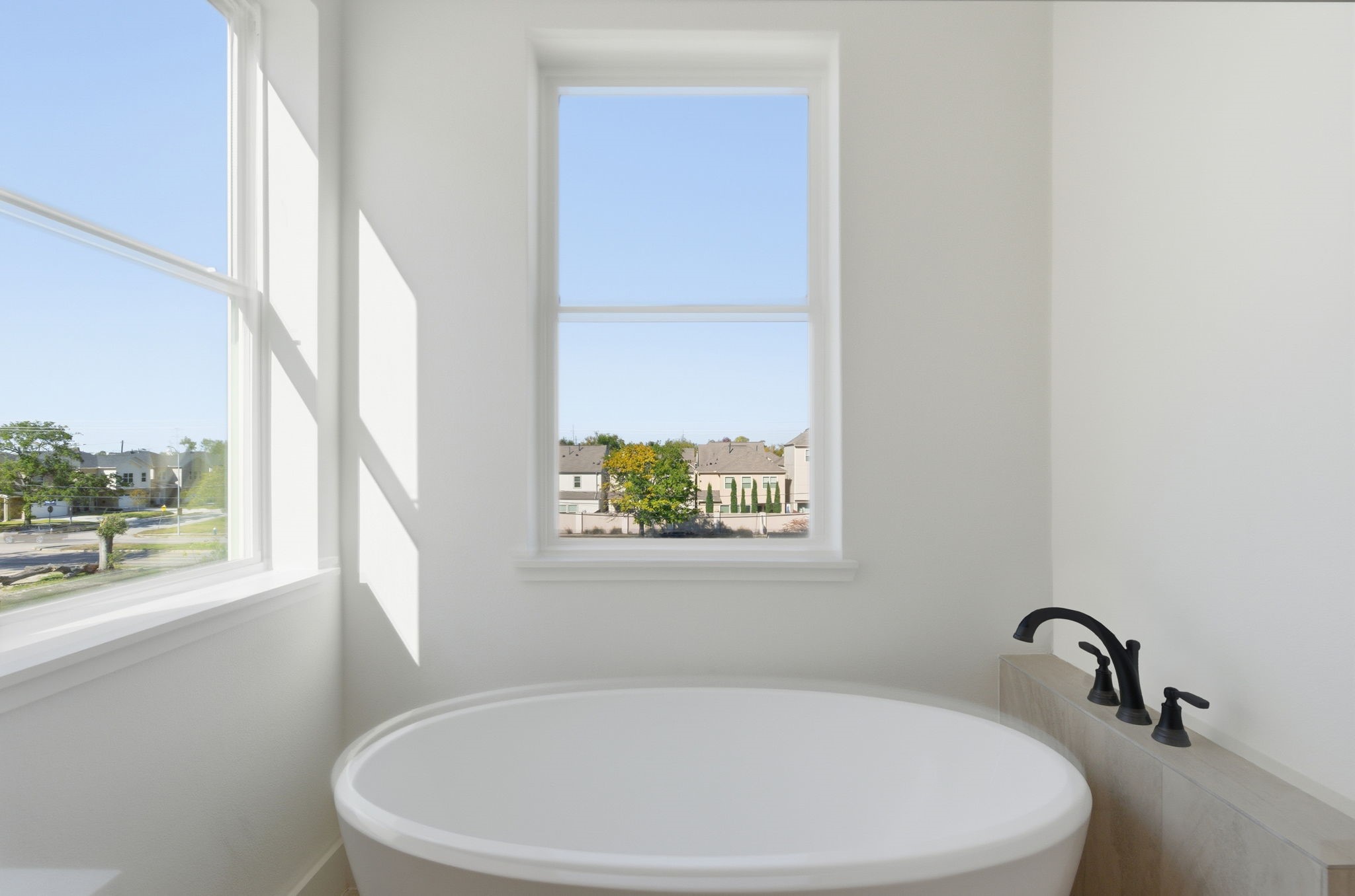 7706 Earl Rudder Way Houston, TX 77055 - Photo 33 of 46 a white bath tub sitting next to a window